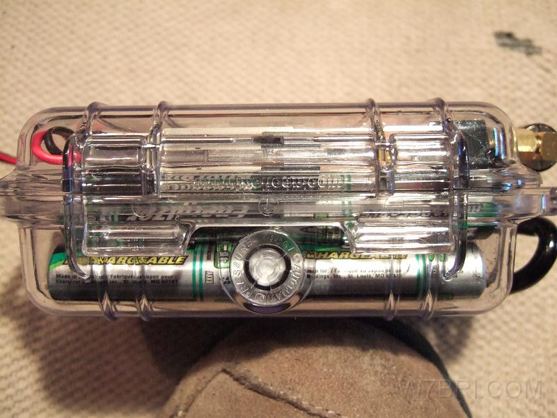 Side.JPG - In this version of the APRS pack, I stacked 2 sets of 10 rechargeable AA batteries on top of one another.  In the 09X0 pack, I use a smaller case for the transmitter but the same case shown here for the batteries -- 3 sets of 10 AAs.